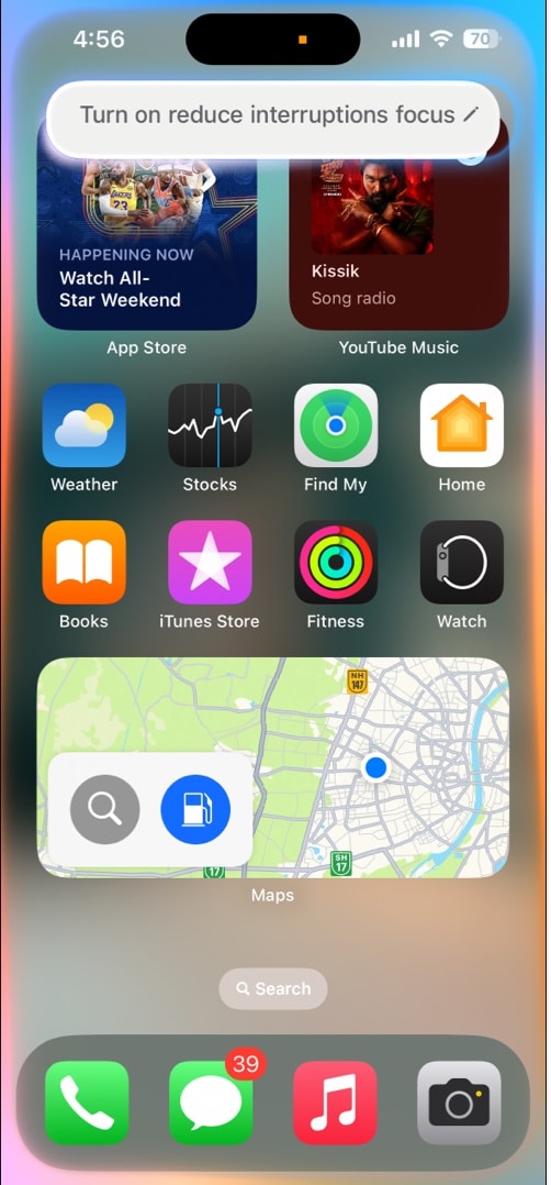 Asking Siri to enable the Reduce Interruptions Focus on an iPhone