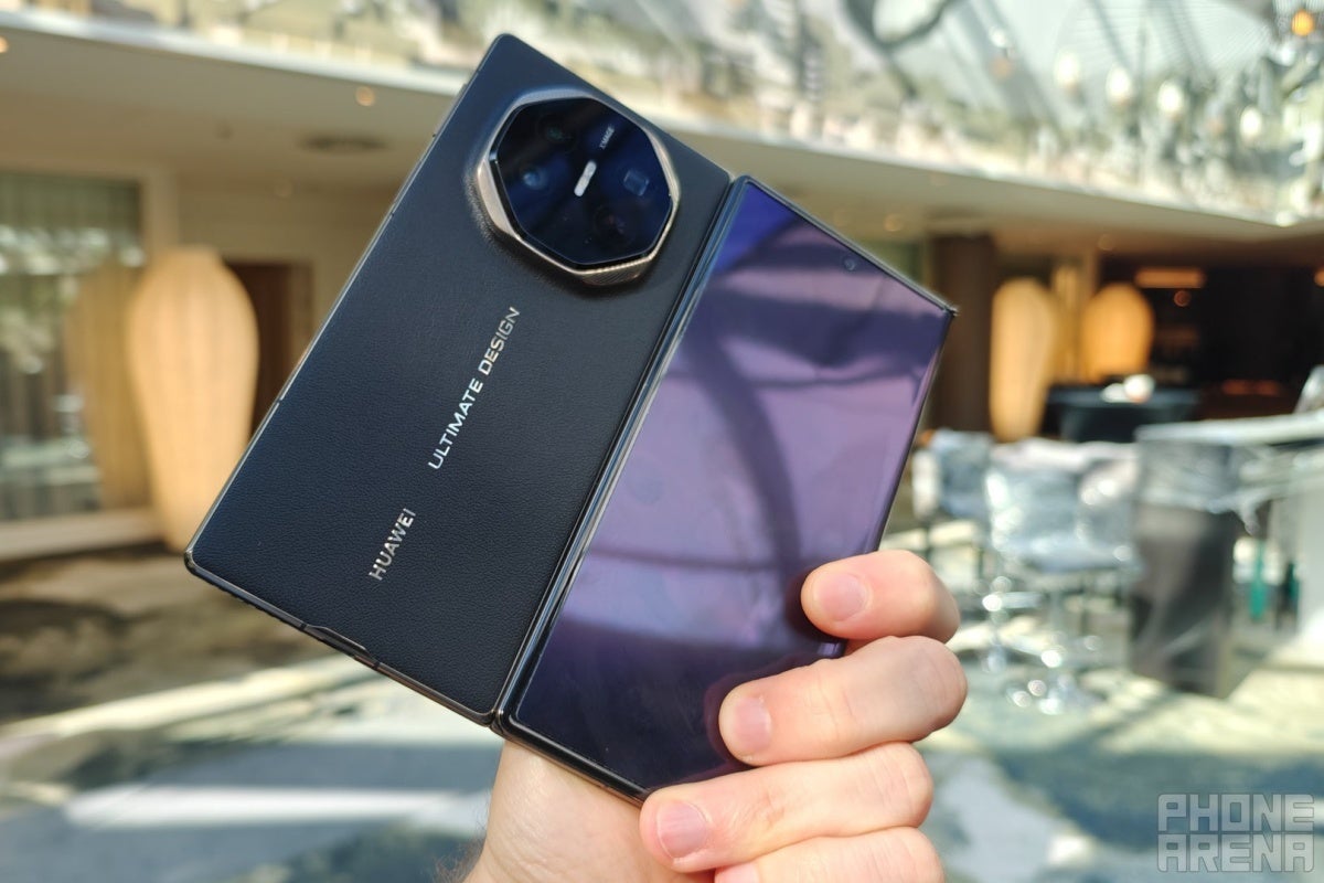 The pioneering Huawei Mate XT doesn't have a separate cover display. | Image Credit -- PhoneArena - Samsung's first tri-fold device could have one big thing in common with the Galaxy Z Fold 7